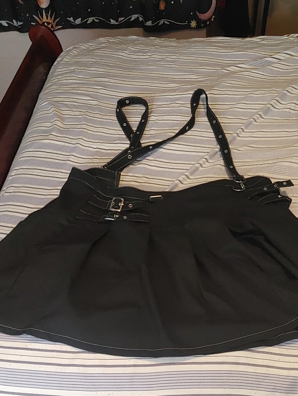 Black Pleated Mini Skirt with Adjustable Buckle Straps